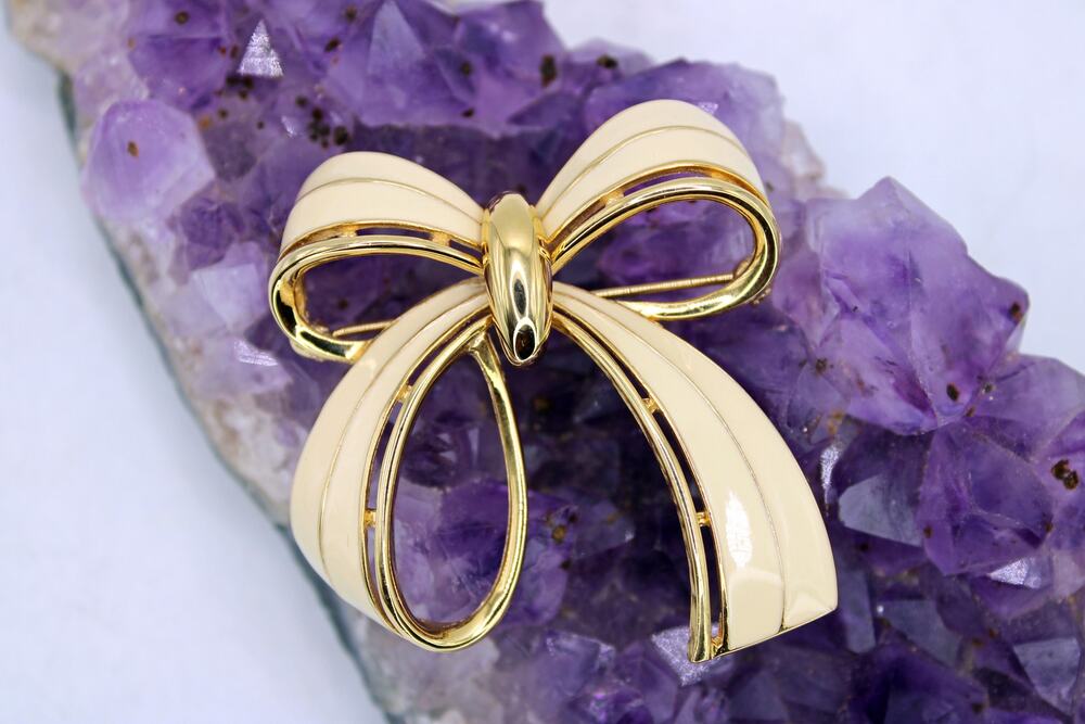 Vintage Monet Goldtone Cream Enamel Bow Brooch